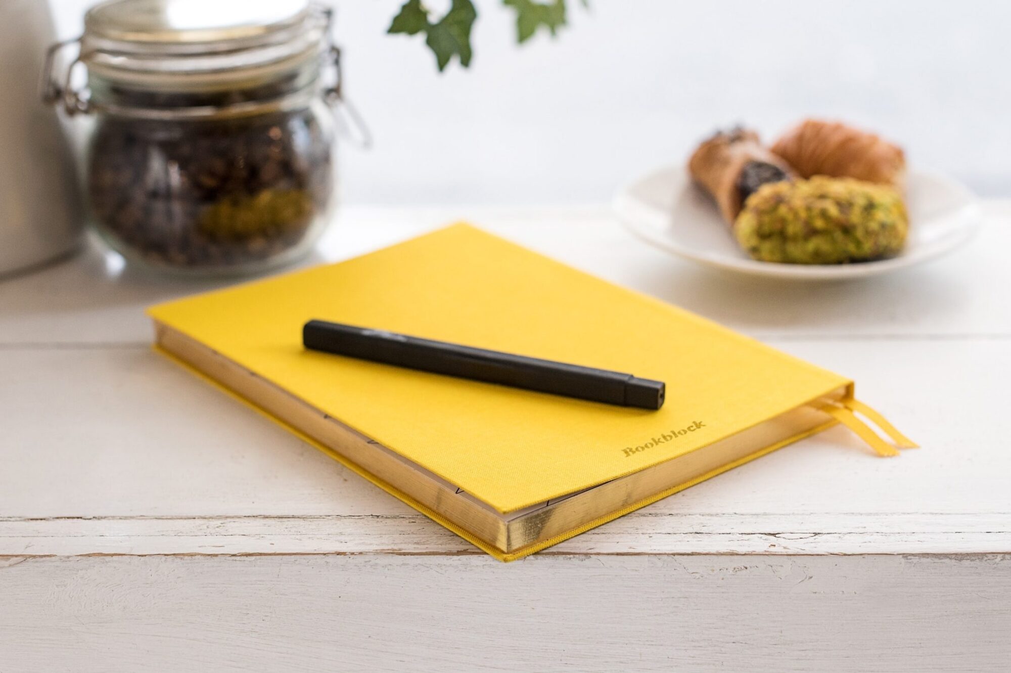 Yellow notebook on desk